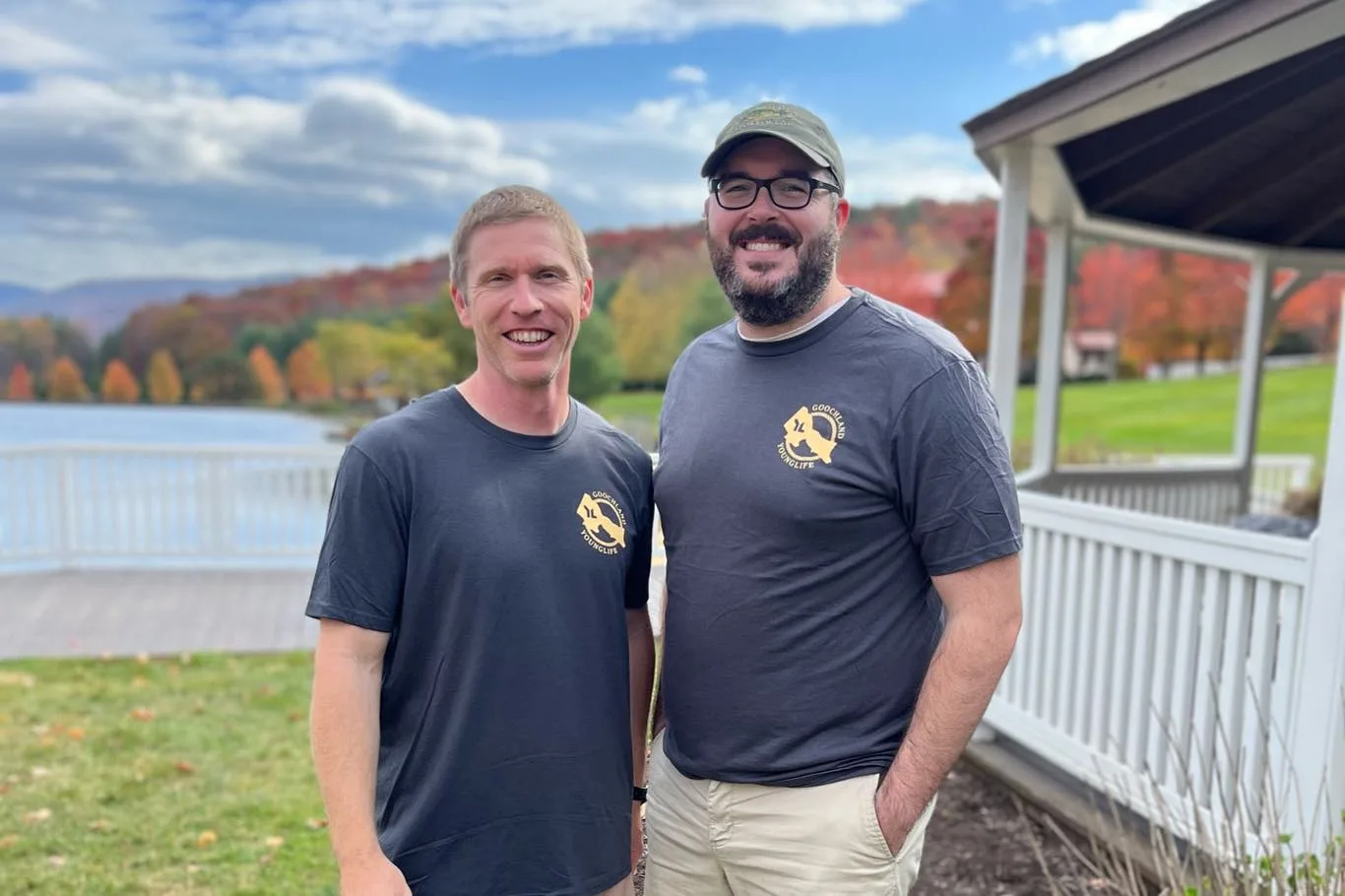 Two church members serving together outdoors